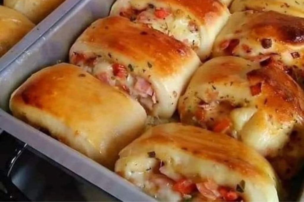 Enroladinho de presunto e queijo se você quer um lanche gostoso e econômico para o lanche da sua família, você não pode perder essa receita